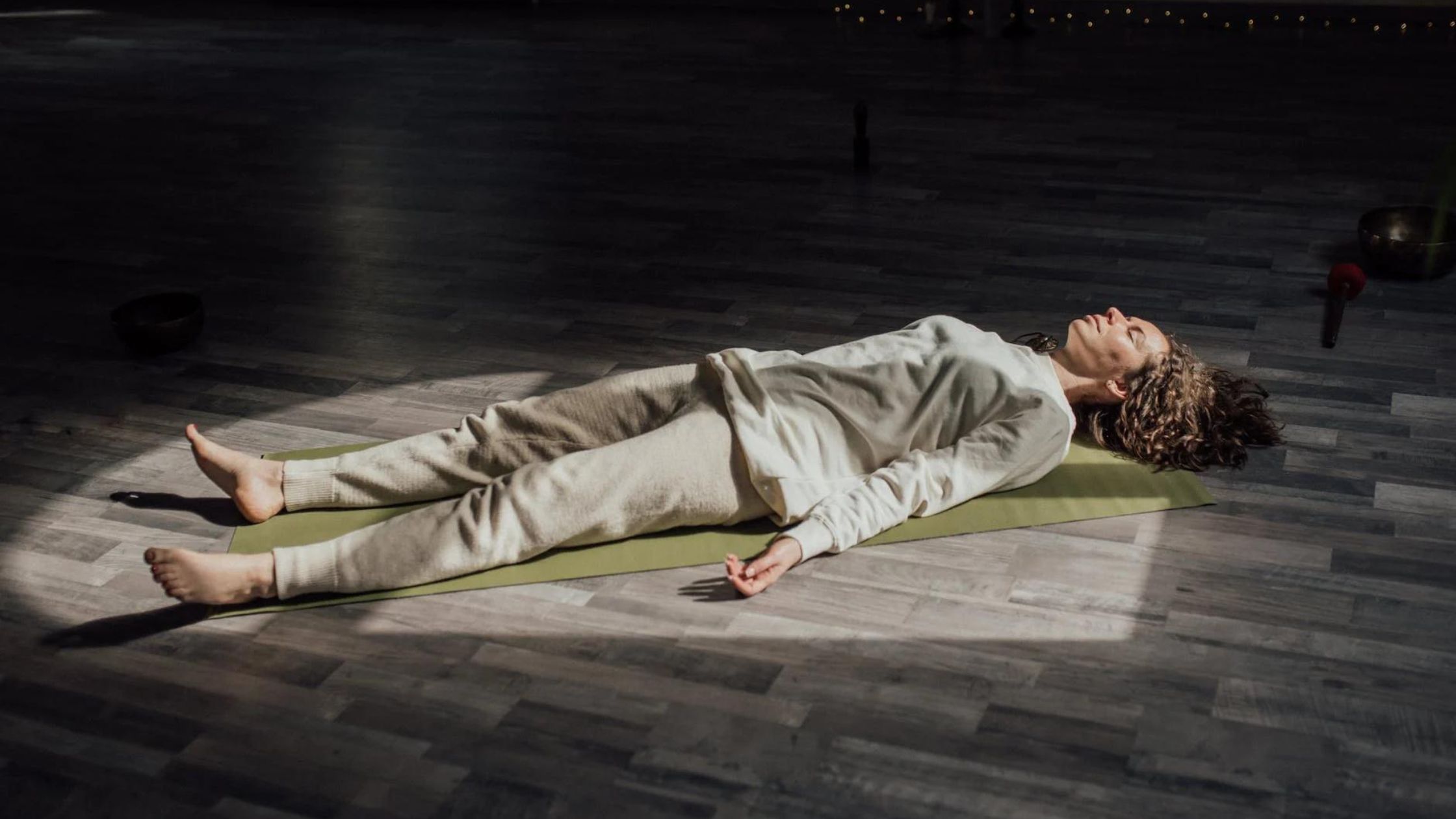 progressive muscle relaxation technique woman lying down