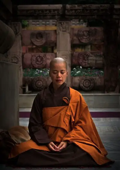 Tibetan monk sitting in meditation